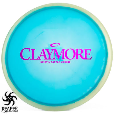 Latitude 64 Opto Moonshine Orbit Claymore (Kristin Tattar) 180g Blue-ish w/Purple Stamp